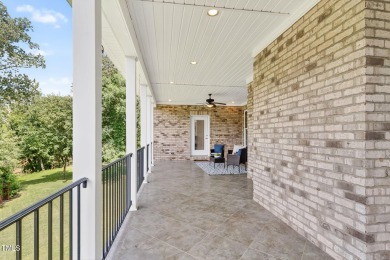 This custom-designed all brick estate on 1.2 acres offers nearly on Chicora Golf Course in North Carolina - for sale on GolfHomes.com, golf home, golf lot