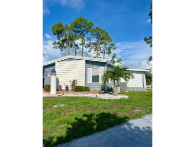 Welcome to this spacious 2-bedroom, 2-bath home located gated on Lake Fairways Country Club in Florida - for sale on GolfHomes.com, golf home, golf lot