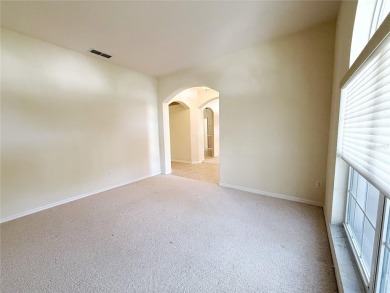 Welcome to this beautifully updated St. Clair model, perfectly on Kings Ridge Golf Club in Florida - for sale on GolfHomes.com, golf home, golf lot