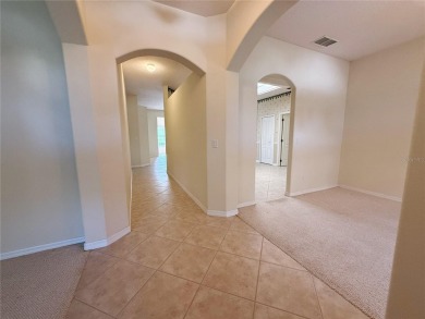 Welcome to this beautifully updated St. Clair model, perfectly on Kings Ridge Golf Club in Florida - for sale on GolfHomes.com, golf home, golf lot