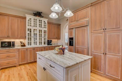 This elegant, custom-built home epitomizes the gracious southern on Woodside Plantation Country Club in South Carolina - for sale on GolfHomes.com, golf home, golf lot