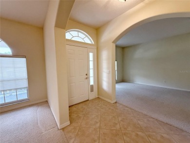 Welcome to this beautifully updated St. Clair model, perfectly on Kings Ridge Golf Club in Florida - for sale on GolfHomes.com, golf home, golf lot