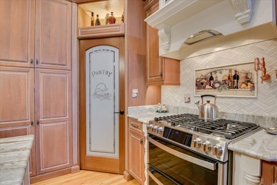 This elegant, custom-built home epitomizes the gracious southern on Woodside Plantation Country Club in South Carolina - for sale on GolfHomes.com, golf home, golf lot