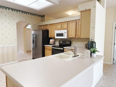 Welcome to this beautifully updated St. Clair model, perfectly on Kings Ridge Golf Club in Florida - for sale on GolfHomes.com, golf home, golf lot