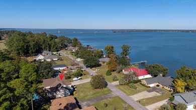 Live where every day feels like a getaway--gated luxury, Lake on Santee-Cooper Country Club in South Carolina - for sale on GolfHomes.com, golf home, golf lot