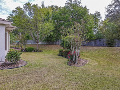 Fabulous Santa Rosa model boasts brick pavers on driveway and on Eagle Ridge At Spruce Creek Country Club in Florida - for sale on GolfHomes.com, golf home, golf lot