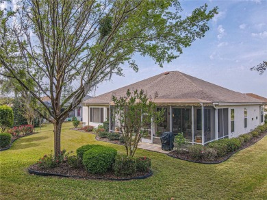 Fabulous Santa Rosa model boasts brick pavers on driveway and on Eagle Ridge At Spruce Creek Country Club in Florida - for sale on GolfHomes.com, golf home, golf lot