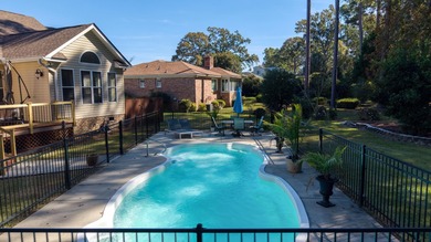 Live where every day feels like a getaway--gated luxury, Lake on Santee-Cooper Country Club in South Carolina - for sale on GolfHomes.com, golf home, golf lot