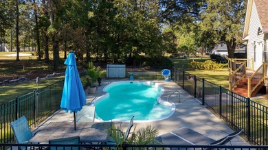 Live where every day feels like a getaway--gated luxury, Lake on Santee-Cooper Country Club in South Carolina - for sale on GolfHomes.com, golf home, golf lot