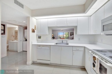 Enjoy the spectacular LAKE view from this beautiful 2/2 located on Flamingo Lakes Country Club in Florida - for sale on GolfHomes.com, golf home, golf lot