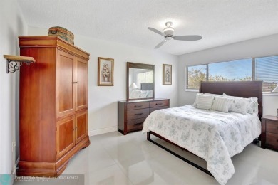 Enjoy the spectacular LAKE view from this beautiful 2/2 located on Flamingo Lakes Country Club in Florida - for sale on GolfHomes.com, golf home, golf lot