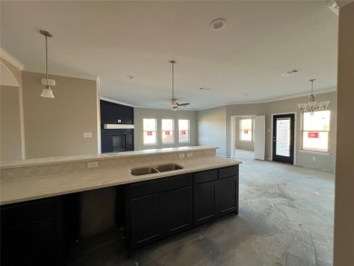 New construction! Located on a quiet street with no neighbor to on Lake Kiowa Golf Course in Texas - for sale on GolfHomes.com, golf home, golf lot