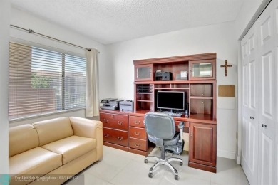 Enjoy the spectacular LAKE view from this beautiful 2/2 located on Flamingo Lakes Country Club in Florida - for sale on GolfHomes.com, golf home, golf lot