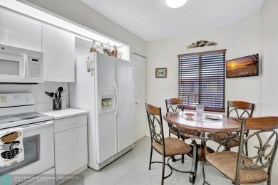 Enjoy the spectacular LAKE view from this beautiful 2/2 located on Flamingo Lakes Country Club in Florida - for sale on GolfHomes.com, golf home, golf lot