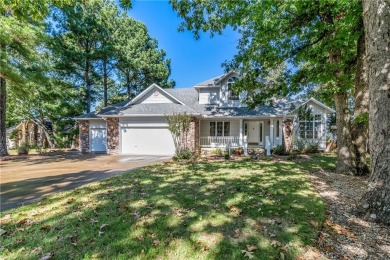 You'll enjoy this Holiday Island getaway on the 19-hole golf on Holiday Island Golf Course in Arkansas - for sale on GolfHomes.com, golf home, golf lot