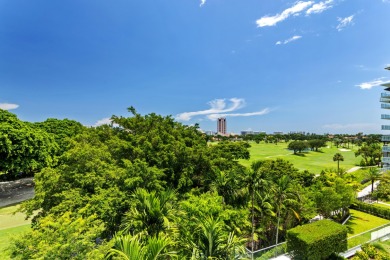 Immersed in verdant, canopied landscaping, offering panoramic on Boca Raton Resort and Club in Florida - for sale on GolfHomes.com, golf home, golf lot