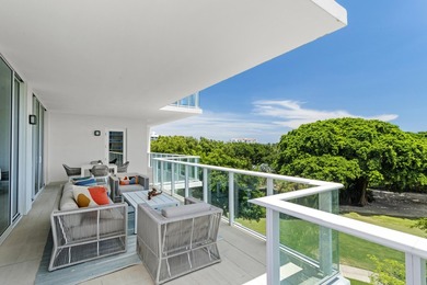 Immersed in verdant, canopied landscaping, offering panoramic on Boca Raton Resort and Club in Florida - for sale on GolfHomes.com, golf home, golf lot