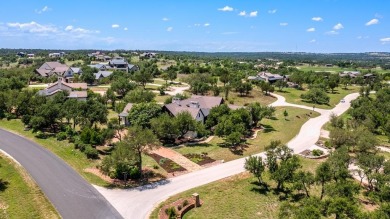 Experience refined living at 114 Turning Stone Circle, a on Boot Ranch Golf Club in Texas - for sale on GolfHomes.com, golf home, golf lot