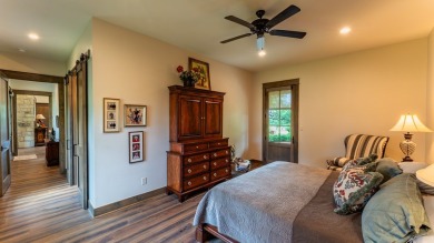 Experience refined living at 114 Turning Stone Circle, a on Boot Ranch Golf Club in Texas - for sale on GolfHomes.com, golf home, golf lot