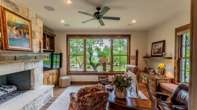 Experience refined living at 114 Turning Stone Circle, a on Boot Ranch Golf Club in Texas - for sale on GolfHomes.com, golf home, golf lot