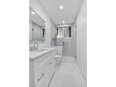 Spacious 1st floor condo in Nassau Bay of Broken Sound Country on Broken Sound Golf and Club  in Florida - for sale on GolfHomes.com, golf home, golf lot