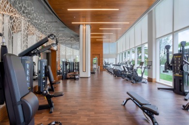 Immersed in verdant, canopied landscaping, offering panoramic on Boca Raton Resort and Club in Florida - for sale on GolfHomes.com, golf home, golf lot