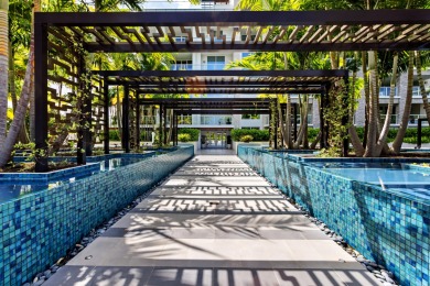 Immersed in verdant, canopied landscaping, offering panoramic on Boca Raton Resort and Club in Florida - for sale on GolfHomes.com, golf home, golf lot