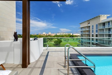 Immersed in verdant, canopied landscaping, offering panoramic on Boca Raton Resort and Club in Florida - for sale on GolfHomes.com, golf home, golf lot