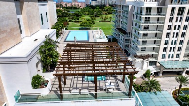 Immersed in verdant, canopied landscaping, offering panoramic on Boca Raton Resort and Club in Florida - for sale on GolfHomes.com, golf home, golf lot