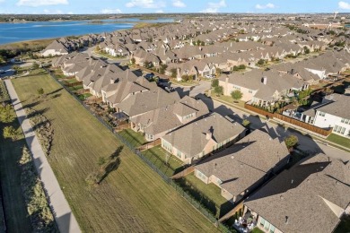 Discover this stunning single-story home in The Tribute,a on The Tribute At the Colony in Texas - for sale on GolfHomes.com, golf home, golf lot