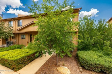 Stunning end-unit townhome located on the Aspen Golf Course on Aspen Valley Golf Club in Arizona - for sale on GolfHomes.com, golf home, golf lot