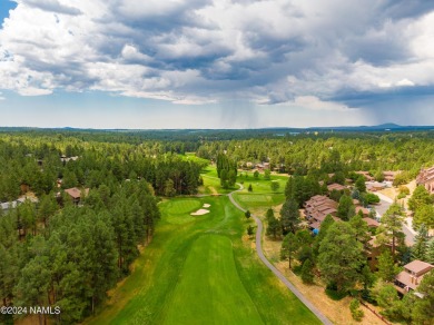 Stunning end-unit townhome located on the Aspen Golf Course on Aspen Valley Golf Club in Arizona - for sale on GolfHomes.com, golf home, golf lot