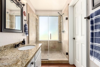 Tucked inside the beautifully landscaped Village Square Condos on Westbrook Village Golf Club in Arizona - for sale on GolfHomes.com, golf home, golf lot