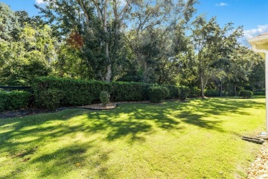 Unique PRIVATE VIEW of the woods behind this property on a quiet on Mallory Hill Golf and Country Club in Florida - for sale on GolfHomes.com, golf home, golf lot