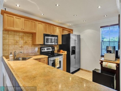 This lovely 1-bedroom, 1.5-bathroom property presents a charming on Palm-Aire Country Club and Resort - The Oaks in Florida - for sale on GolfHomes.com, golf home, golf lot