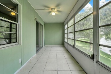 Experience serene waterfront living in this beautifully on Hillsboro Pines Golf in Florida - for sale on GolfHomes.com, golf home, golf lot