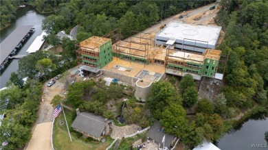 Imagine life in a lakeside condominium with a carefully curated on  in Alabama - for sale on GolfHomes.com, golf home, golf lot