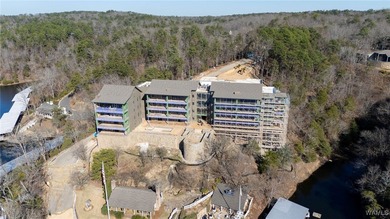 Imagine life in a lakeside condominium with a carefully curated on NorthRiver Yacht Club in Alabama - for sale on GolfHomes.com, golf home, golf lot