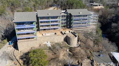 Imagine life in a lakeside condominium with a carefully curated on NorthRiver Yacht Club in Alabama - for sale on GolfHomes.com, golf home, golf lot