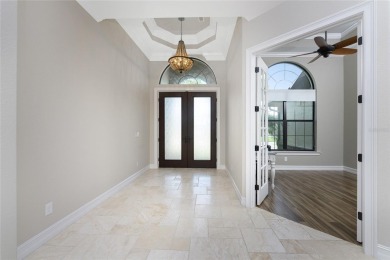 This elegant open concept custom home with superb quality and on Twin Isles Country Club in Florida - for sale on GolfHomes.com, golf home, golf lot