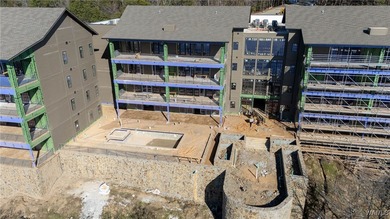 Imagine life in a lakeside condominium with a carefully curated on NorthRiver Yacht Club in Alabama - for sale on GolfHomes.com, golf home, golf lot