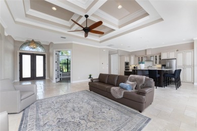 This elegant open concept custom home with superb quality and on Twin Isles Country Club in Florida - for sale on GolfHomes.com, golf home, golf lot