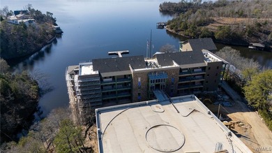 Imagine life in a lakeside condominium with a carefully curated on NorthRiver Yacht Club in Alabama - for sale on GolfHomes.com, golf home, golf lot