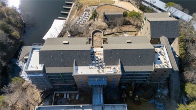 Imagine life in a lakeside condominium with a carefully curated on NorthRiver Yacht Club in Alabama - for sale on GolfHomes.com, golf home, golf lot