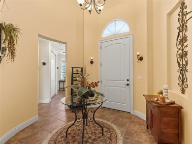 IMPROVED PRICE--An iconic palm tree and elegant paver driveway on Harbor Hills Country Club in Florida - for sale on GolfHomes.com, golf home, golf lot