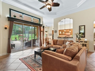 IMPROVED PRICE--An iconic palm tree and elegant paver driveway on Harbor Hills Country Club in Florida - for sale on GolfHomes.com, golf home, golf lot