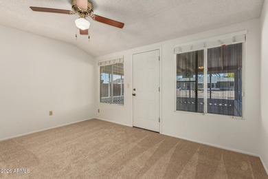 Welcome home to this light and bright 2-bedroom, 2-bath home on Sun City Lakes West and East in Arizona - for sale on GolfHomes.com, golf home, golf lot