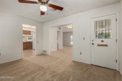 Welcome home to this light and bright 2-bedroom, 2-bath home on Sun City Lakes West and East in Arizona - for sale on GolfHomes.com, golf home, golf lot