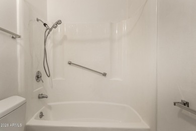 Welcome home to this light and bright 2-bedroom, 2-bath home on Sun City Lakes West and East in Arizona - for sale on GolfHomes.com, golf home, golf lot