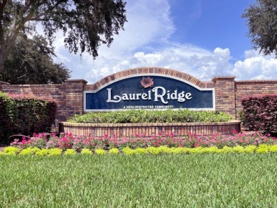 Welcome to the lovely Laurel Ridge neighborhood, where your on Twisted Oaks Golf Club in Florida - for sale on GolfHomes.com, golf home, golf lot